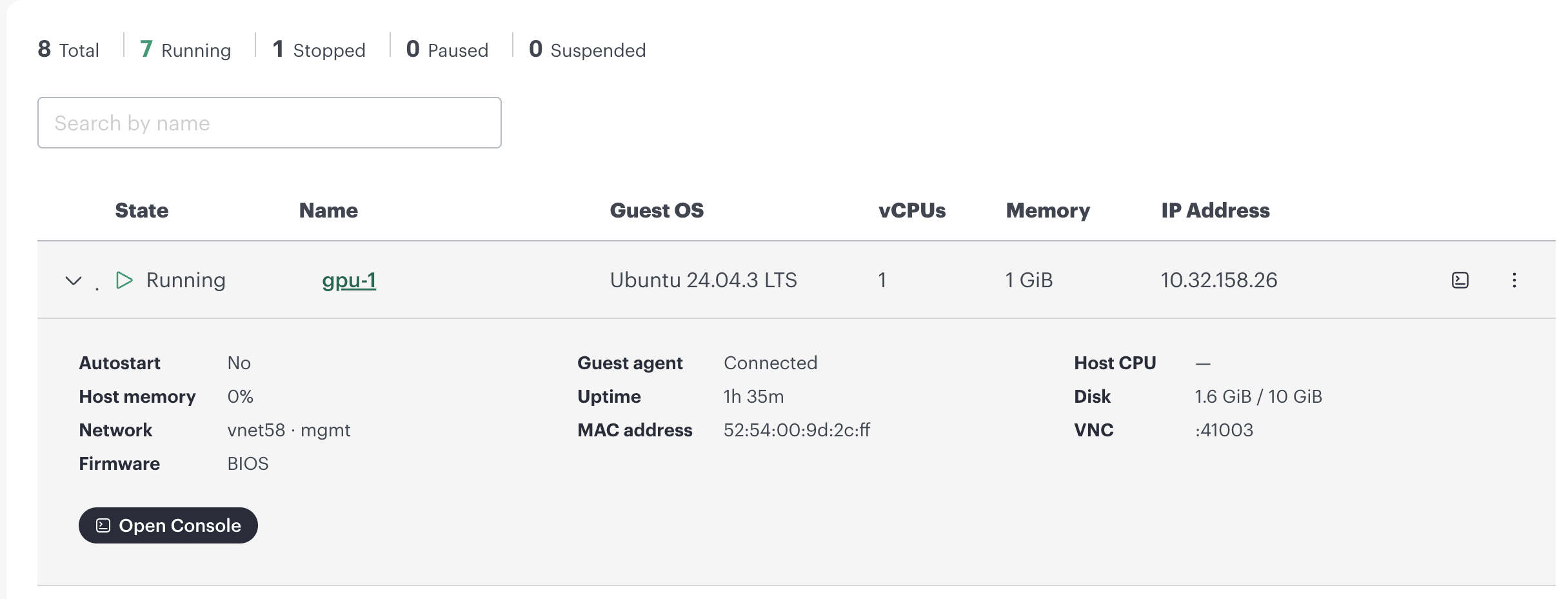 Expanded VM row showing summary details and the Open Console button